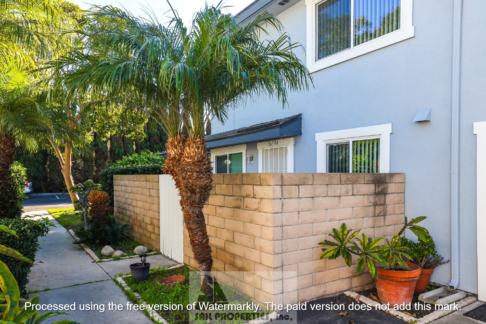 Welcome to this charming two-story home located in the vibrant Huntington Beach property image