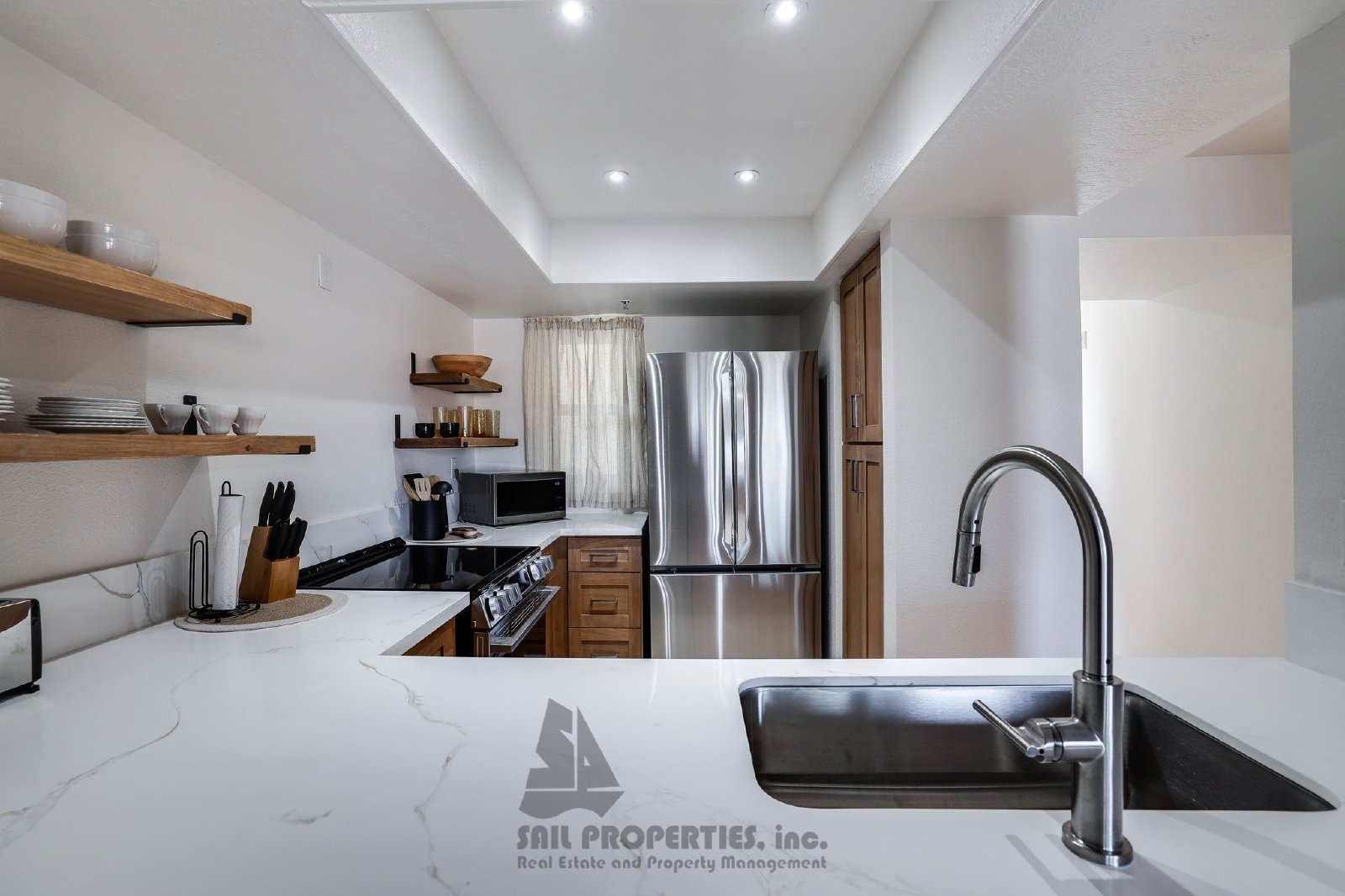 1200 PCH #327 is a third-floor, one-bedroom, one-bath condo in the gated Pierhouse community of Huntington Beach property image