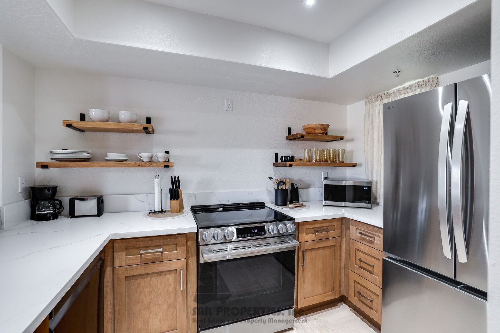 1200 PCH #327 is a third-floor, one-bedroom, one-bath condo in the gated Pierhouse community of Huntington Beach property image