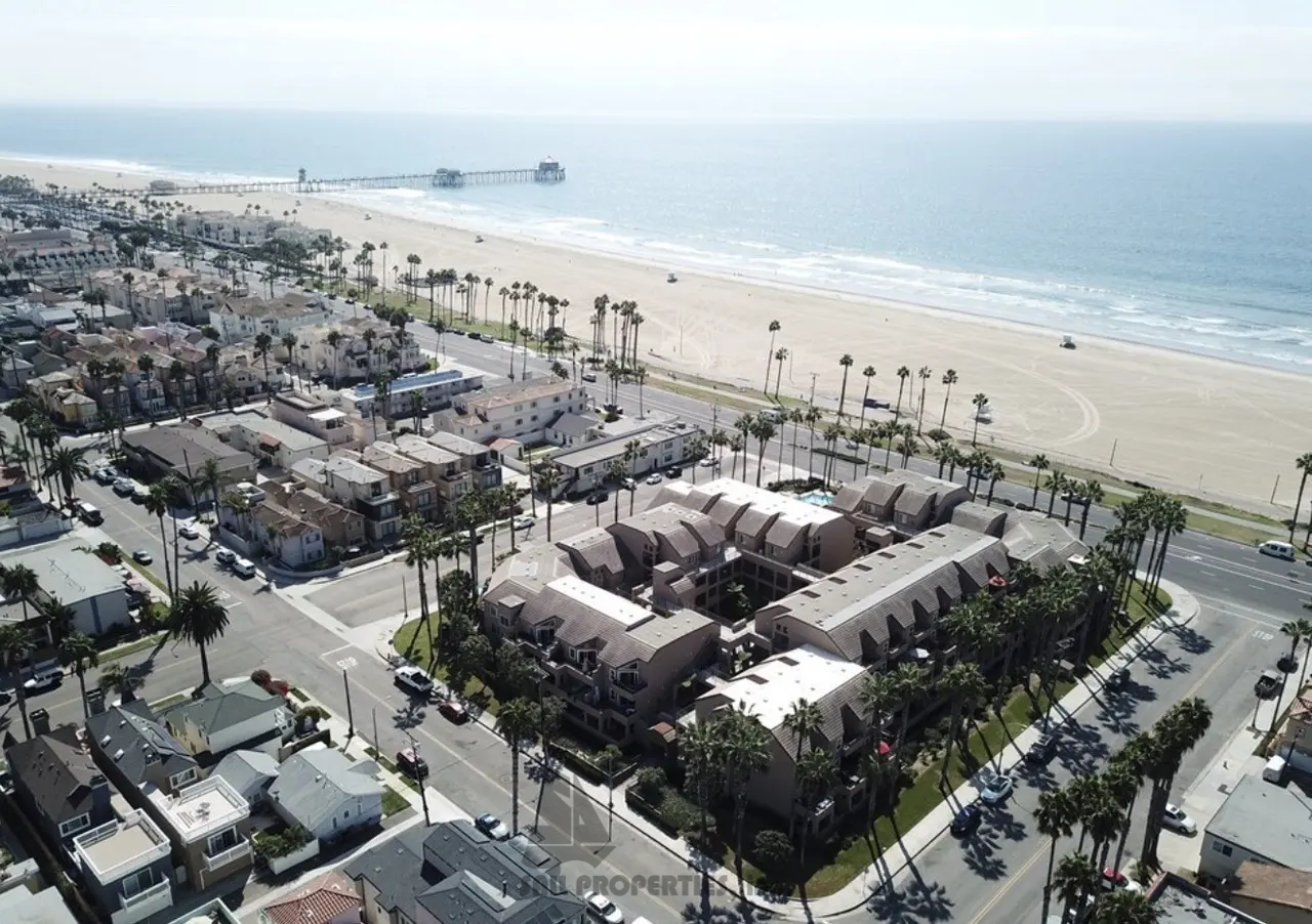 Beachside living starts here at 1200 PCH #327, a third-floor, one-bedroom, one-bath condo in the gated Pierhouse community of Huntington Beach, just steps from the ocean property image