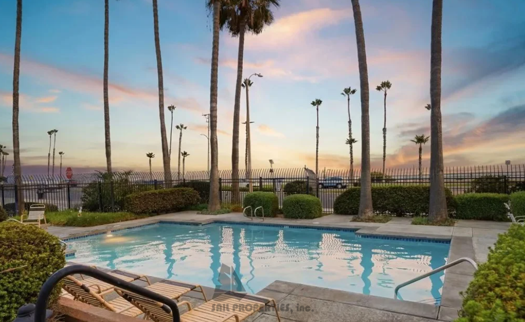 Beachside living starts here at 1200 PCH #327, a third-floor, one-bedroom, one-bath condo in the gated Pierhouse community of Huntington Beach, just steps from the ocean property image